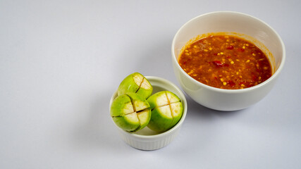 Thai shrimp paste chili dip eat with fresh eggplant, Thai food, Thai chili paste, Nam Prik, Copy space.