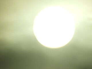 the light of the moon's silhouette that refracts into the universe illuminates the earth and warms the twilight and humans. the dark night are silent and calm hearing wind across the way. Focus blur