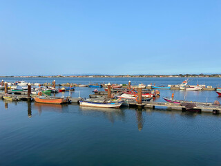Costa Nova, Portugal, August 21, 2021: Artisanal Fishing Marina of Costa Nova. Marina with moored boats.