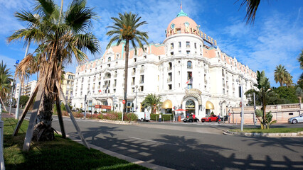 Naklejka premium Nice, France, October 3, 2021: The Hotel Negresco is a hotel and site of the restaurant Le Chantecler, located on the Promenade des Anglais on the Baie des Anges in Nice, France.