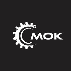 MOK letter technology logo design on black background. MOK creative initials letter IT logo concept. MOK setting shape design.
