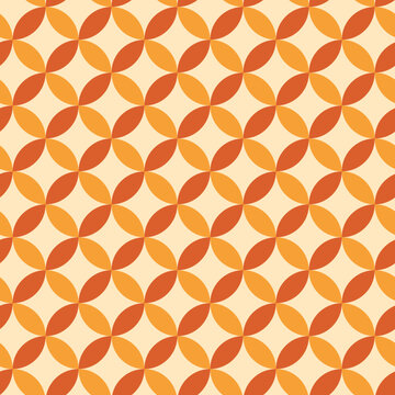 Fototapeta Mid century modern geometric circles seamless pattern in orange and yellow. For wallpaper, home décor and fabric  