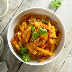 Homemade roasted pumpkin with fresh parsley