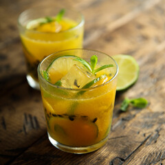 Refreshing passion fruit cocktail with lime