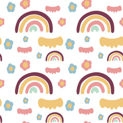 Seamless pattern of colors and rainbows. The pattern is in pastel colors. Children's print. Print for printing on fabric, packaging paper.