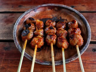 grilled pentol or grilled meatball is a delicious street food
