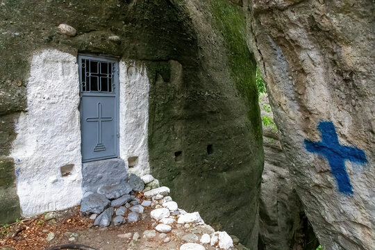 The small chapel carved into the rock on the footpath to the rock Holy Spirit (Agio Pnevma) in Kastraki, Meteora, Kalambaka, Thessaly, Greece, Europe. Hiking through Meteora hermit caves