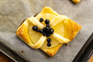 Pineapple Puff Pastry with blueberry dessert. food concept