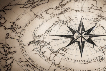 Fototapeta na wymiar Antique compass rose and old map, vintage