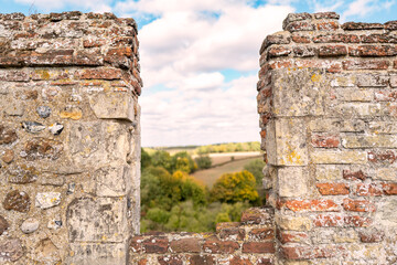 English castle seen through the ramparts with a view to the surrounding countryside. The tower, built by the Normans early in English history.