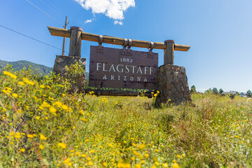 Rustic sign at the town limits of Flagstaff, Arizona