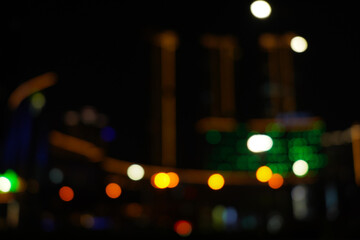 Fototapeta na wymiar Defocused urban abstract texture background, blurred lights, City night light, light bokeh