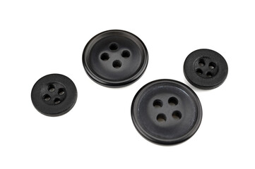 2 large black buttons and 2 small black buttons