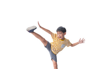 Isolated portrait of an Asian boy jump kick target to copy space sideway - obrazy, fototapety, plakaty