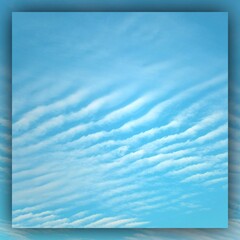 pale blue sky with white cloud pattern and design