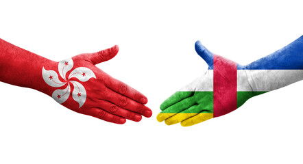 Handshake between Central African Republic and Hong Kong flags painted on hands, isolated transparent image.