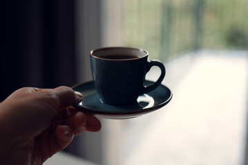 Close up view of coffee table with coffee cup, decoration and copy space