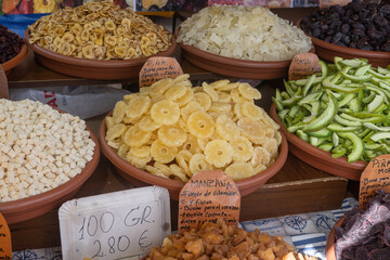 Colorful dried fruits on display at local Spanish food market in Torrevieja