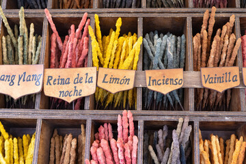 Incense sticks on display in boxes at local Spanish market