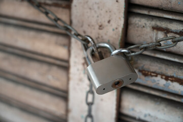 close up metal lock with chain