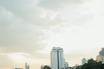 Tall buildings in the city with the evening sun