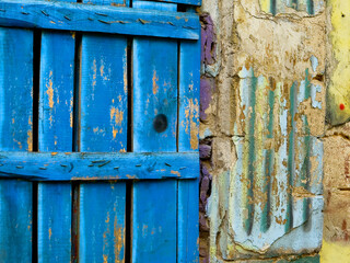 background. Textured old vintage wall with old wooden door. For design