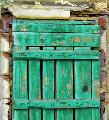 background. Textured old vintage wall with old wooden door. For design