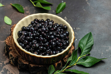 Bilberry. Fresh Wild berries,. Superfoods antioxidant. Bowl of fresh berry on dark background, Long banner format. top view
