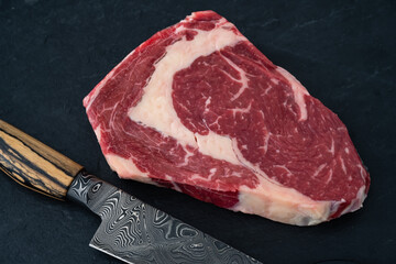 Wagyu Beef Ribeye Steak Raw Dry Aged with Damascus Knife