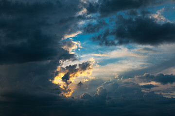 Fantastic cloudscape with sunlight in the evening . Colorful sky clouds