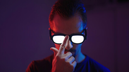 Portrait of man put up glowing glasses like an anime protagonist villain
