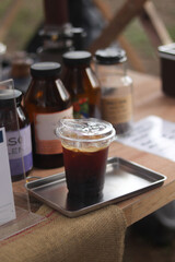a cup of ice amaricano on the table