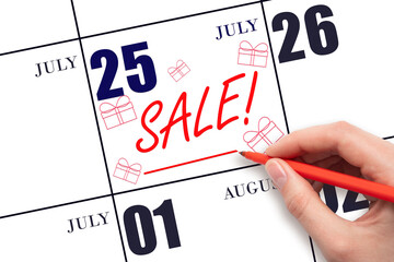 Hand writing text SALE and drawing gift boxes on calendar date July 25. Shopping Reminder