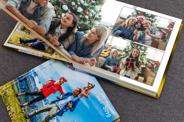 christmas and young family in retro photo book