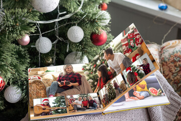 christmas and young family in retro photo book