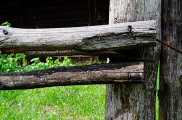 harness for horses , wooden fence