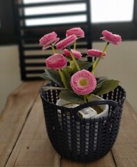 Pink flower in a basket