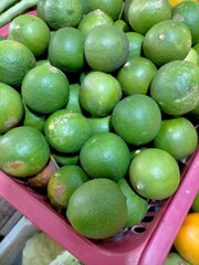 limes and lemons in market