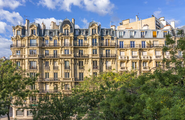 Fototapeta na wymiar Parisian architecture. Typical historical apartment building. Paris, France.