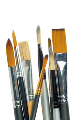 Various professional paint brushes isolated on white background