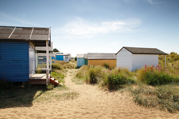 Obraz na płótnie Canvas beach huts by the sea