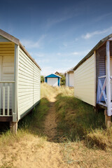 Fototapeta na wymiar beach huts by the sea