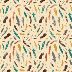 Grunge seamless pattern with colored disheveled feathers on a beige backdrop. Vector repeating background with chaotic scattered bird plumelets in boho style. Wallpaper, wrapping paper, fabric design - 538407592