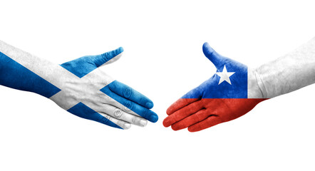 Handshake between Chile and Scotland flags painted on hands, isolated transparent image.