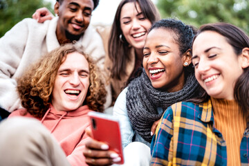 Gen z friends students having fun using mobile smart phone - Multicultural millenial people taking selfie together - obrazy, fototapety, plakaty