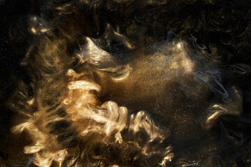 Golden sparkling abstract background, luxury black smoke, acrylic paint underwater explosion, cosmic swirling ink © amixstudio