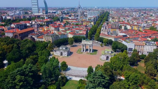 Gate Sempione Porta Sempione city gate to Lombardy in the fall. Arch of Peace. Arco della pace. sunny evening in milan city park aerial panorama 4k italy milano city triumphal arch. Sculptures