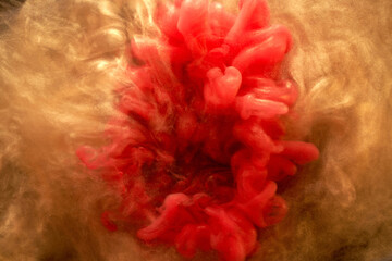 Orange sparkling abstract background, luxury smoke, acrylic paint underwater explosion, cosmic...