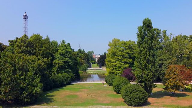 Gate Sempione Porta Sempione city gate to Lombardy in the fall. Arch of Peace. Arco della pace. sunny evening in milan city park aerial panorama 4k italy milano city triumphal arch. Sculptures