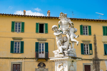 Fototapeta na wymiar Statue near the Leaning Tower of Pisa.